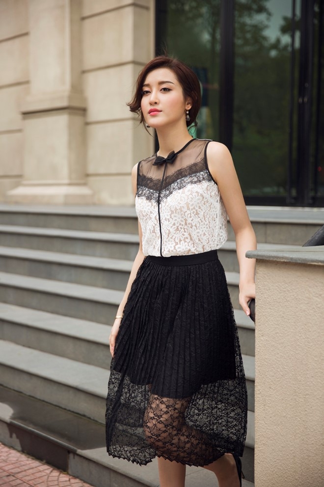 A hau Huyen My goi cam voi dam tre vai tren pho hinh anh 8