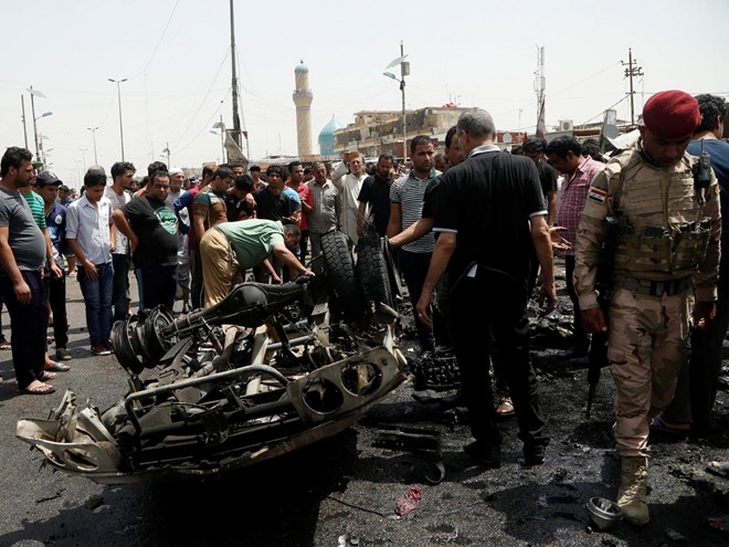 IS danh bom xe giua cho o Iraq, 64 nguoi chet hinh anh 1