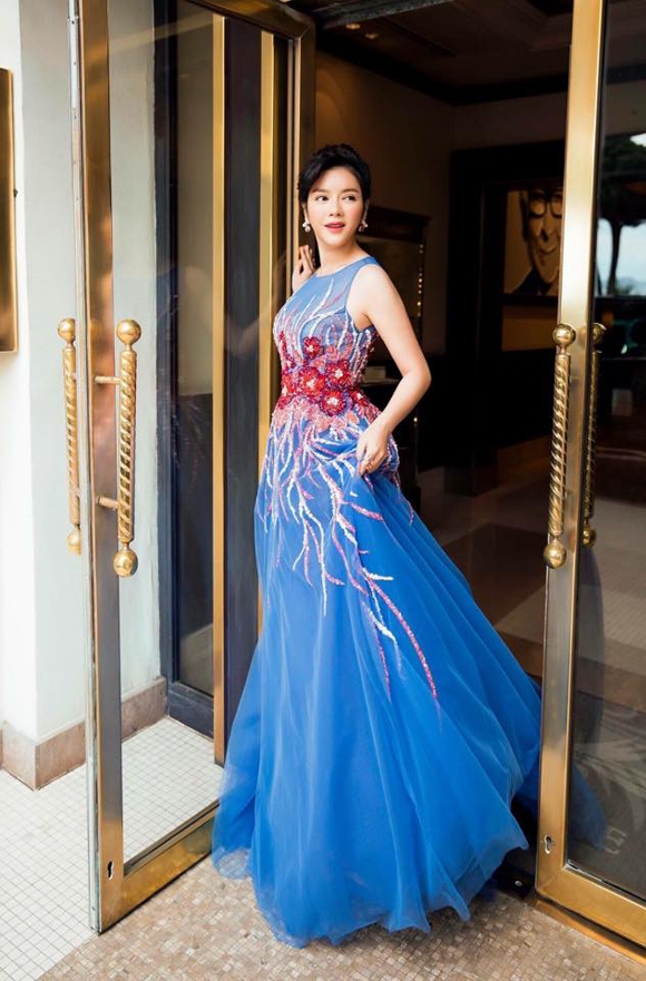 Lý Nhã Kỳ diện đầm xanh mướt 1