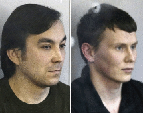 [Caption] Yerofeyev (C) and Alexandrov were facing long sentences in Ukraine