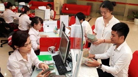 Phia sau cuoc dua lai suat huy dong hinh anh 1