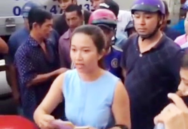 Bi xu phat, 2 co gai bo oto tai tru so Cong an Phu Quoc hinh anh 1