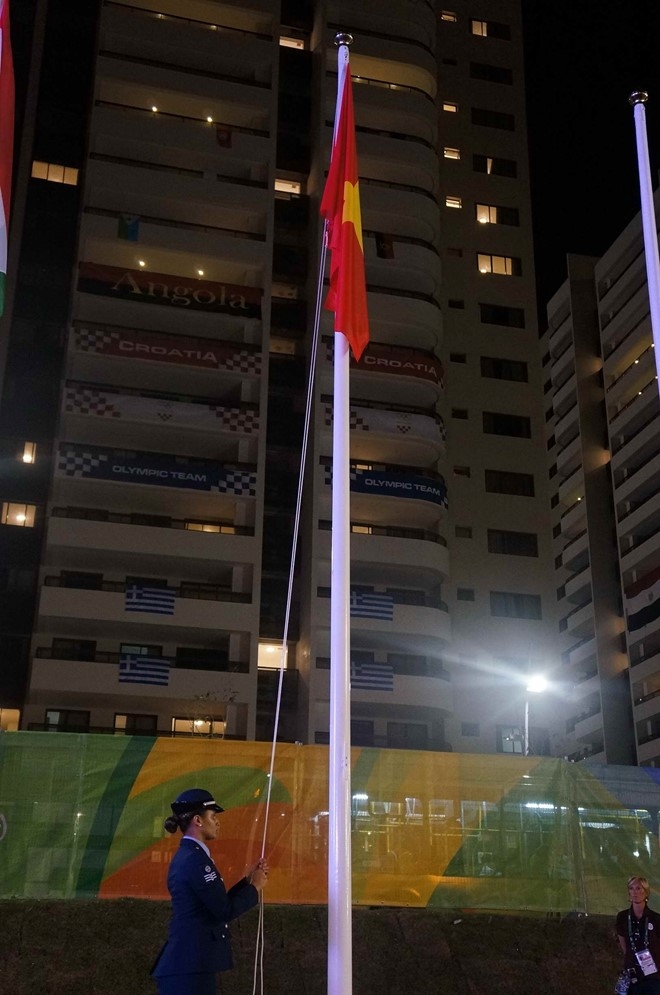 Quoc ky Viet Nam tung bay o Lang Olympic hinh anh 1