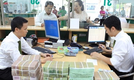 Ngân hàng Nhà nước đã “bơm- hút” tiền tệ thế nào? - 1