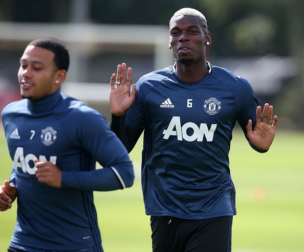 Pogba rang ro trong buoi tap dau tien o MU hinh anh 2