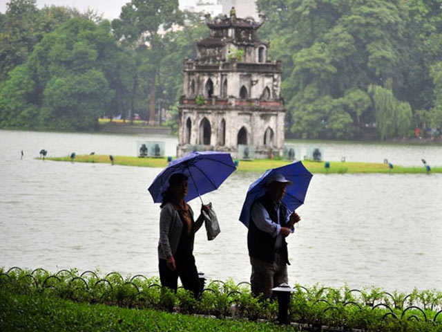 ha noi don khong khi lanh,tp.hcm nguy co ngap nang hinh anh 1