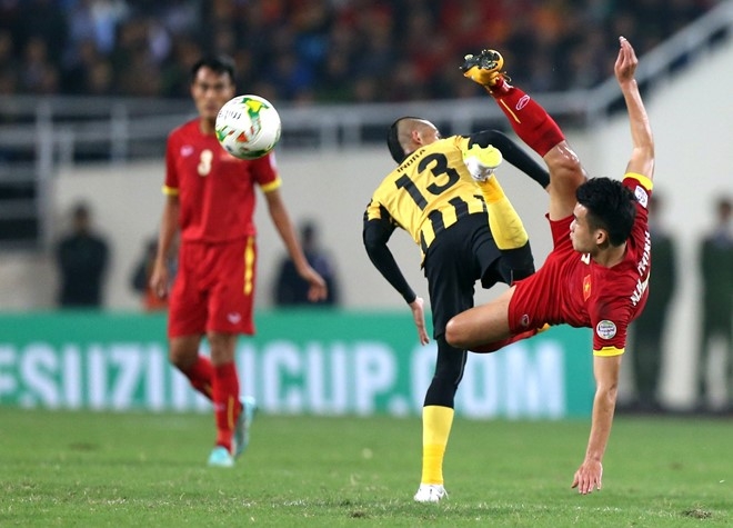 Nam 2014, Cong Vinh, Que Ngoc Hai khoc nuc no vi Malaysia hinh anh 3