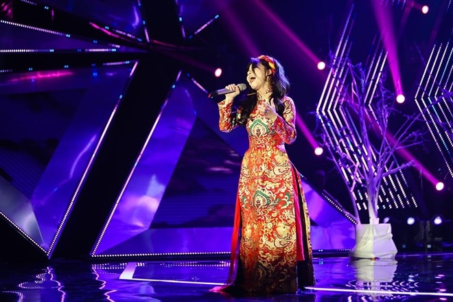 Thu Minh tranh nhac ten Huong Tram tren song truc tiep hinh anh 3