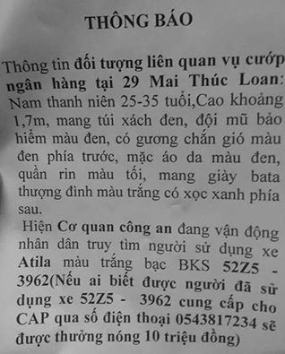 Vu cuop ngan hang: Cong an len tieng ve so tien thuong nong hinh anh 1