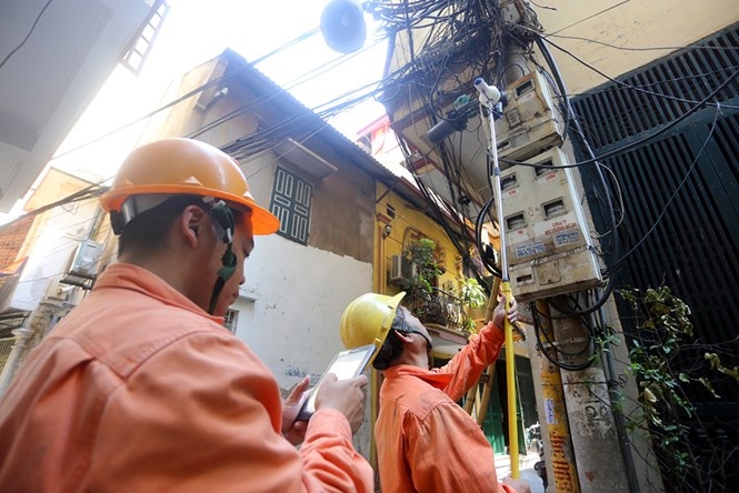 Thiết bị công tơ điện tử công nghệ mới sẽ thay thế việc ghi số điện bằng cách thủ công ///  Ảnh: Ngọc Thắng