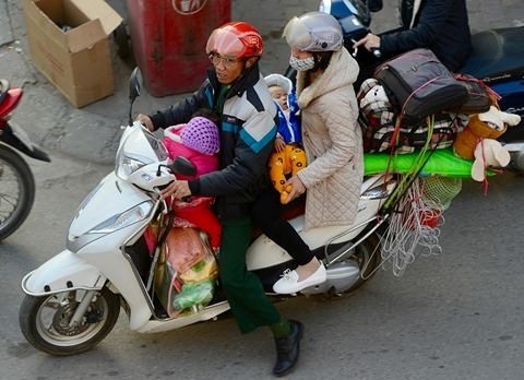 Nguoi dan roi thanh pho nghi Tet hinh anh 1