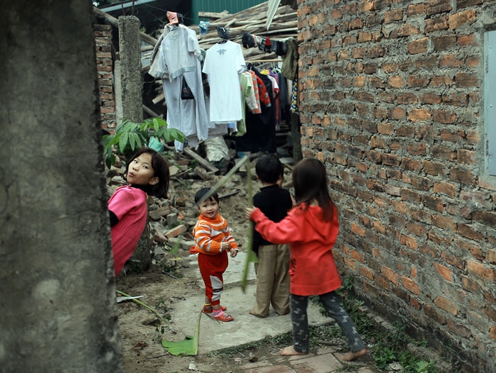 ngay cuoi nam tai nha nguoi phu nu mot minh nuoi 14 dua con o hn - 5