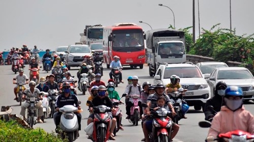 Dân miền Tây ùn ùn trở lại Sài Gòn sau Tết ảnh 3