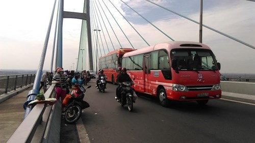 Dân miền Tây ùn ùn trở lại Sài Gòn sau Tết ảnh 8