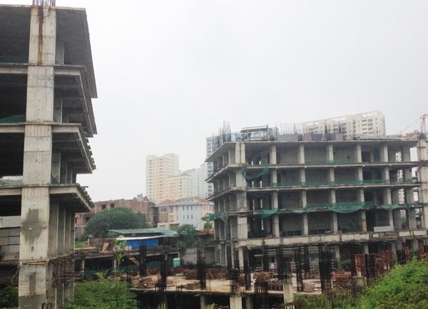 Dân mua cạn tiền, nhà đất giảm giá