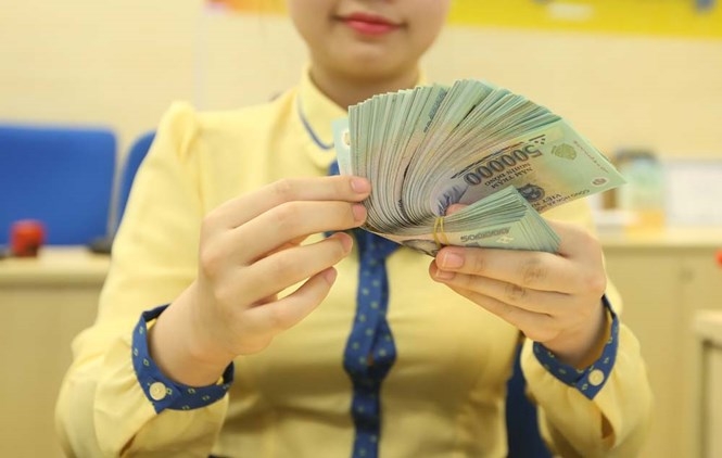 Doanh nghiệp và ngân hàng sẽ được tự do thỏa thuận lãi suất cho vay từ ngày 15.3.2017  /// Ảnh: Ngọc Thắng