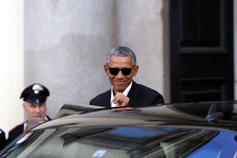 Obama xuat hien day phong cach o kinh do thoi trang Milan hinh anh 11