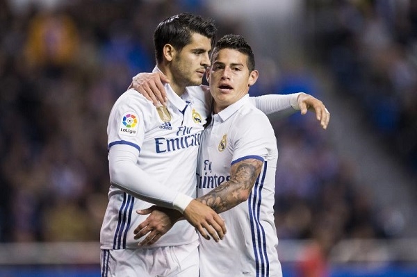 m.u nhan lien tiep don thu tu real madrid hinh anh 1