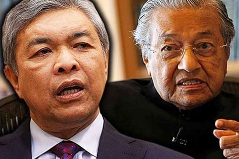  Phó Thủ tướng Ahmad Zahid Hamidi (trái) và cựu Thủ tướng Mahathir Mohamad (phải) đang thách đố nhau để điều tra xem ai là người tham nhũng 